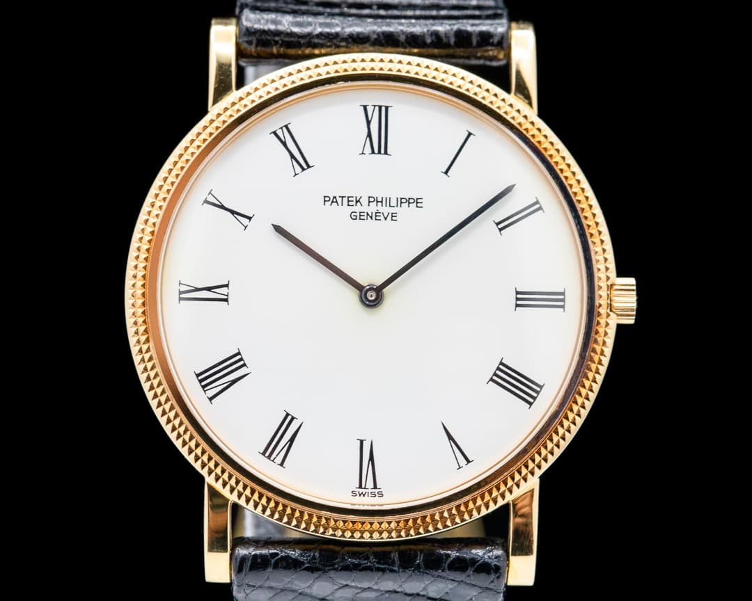 Patek Philippe Calatrava 18K Yellow Gold Manual Wind Silver Roman Dial