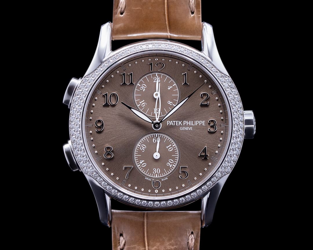 Patek Philippe Calatrava Travel Time 18k White Gold Diamond Bezel 7134G-001