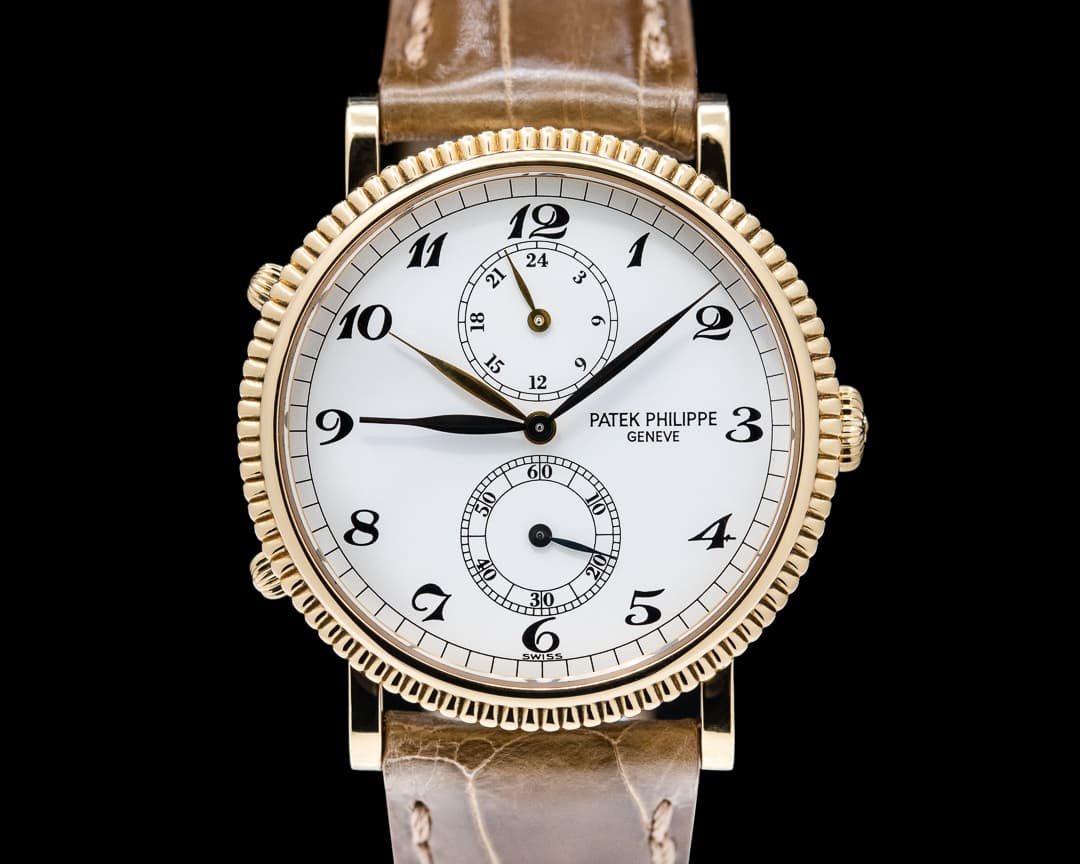Patek Philippe Travel Time 5034J 18K Yellow Gold