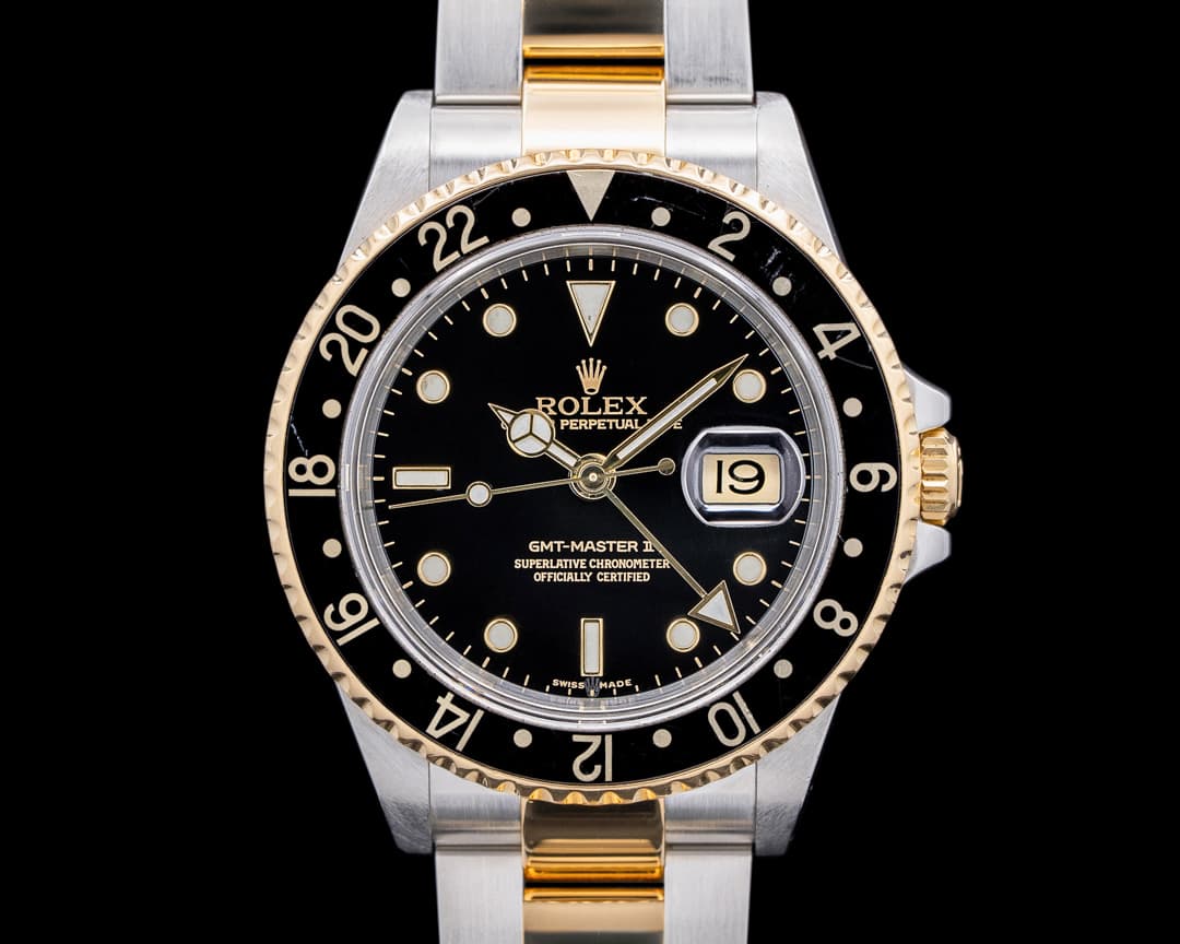 Rolex GMT Master II 16713 SS / 18K Yellow Gold Black Dial