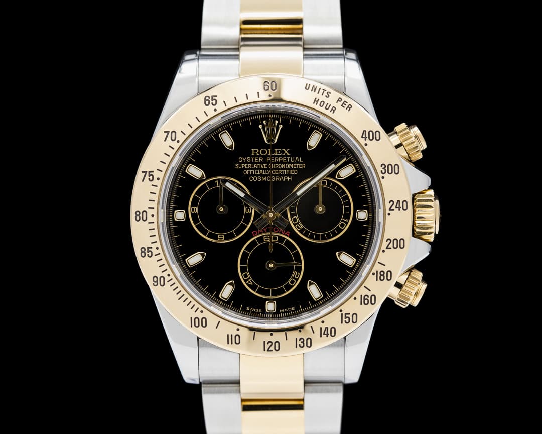Rolex Daytona 116523 18K Yellow Gold / SS Black Dial