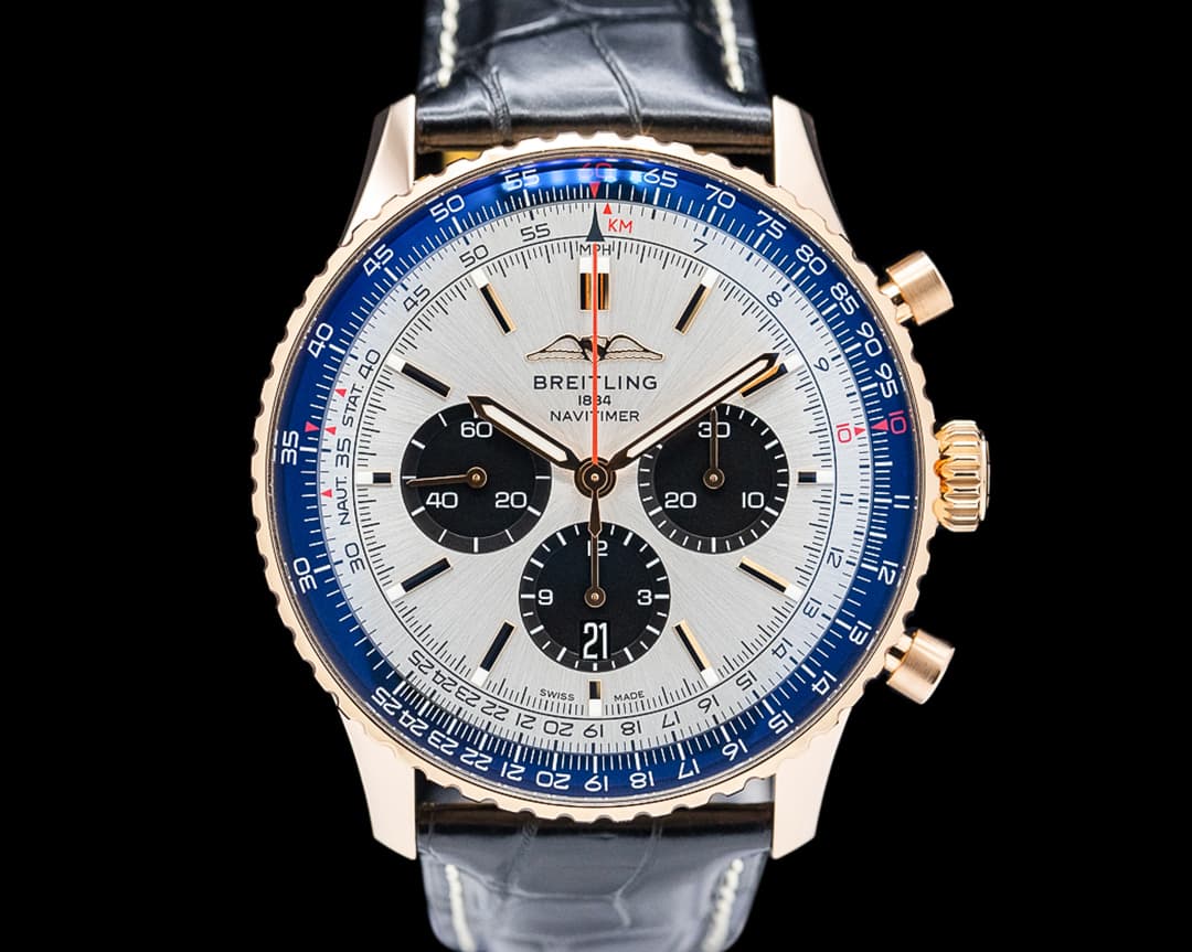 Breitling RB0137 Navitimer B01 Chronograph 18K Red Gold Silver Dial