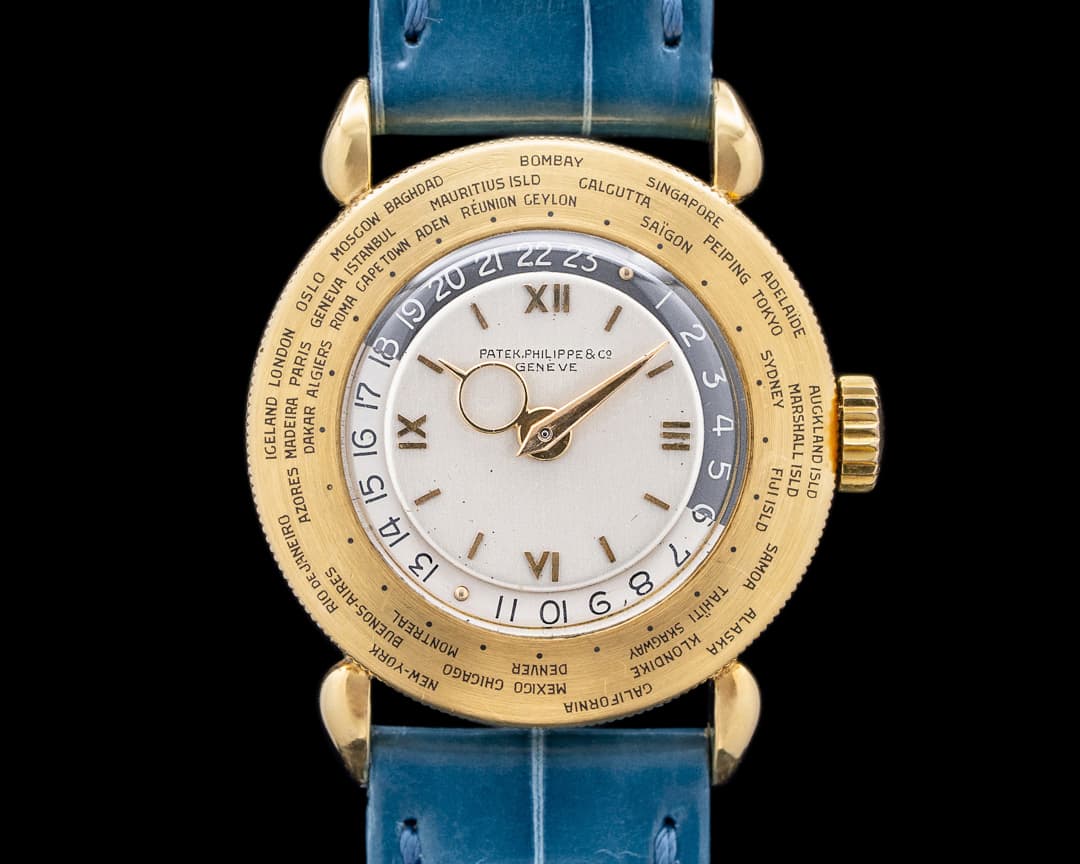 Patek Philippe 1415 World Timer Vintage Yellow Gold Silver Dial