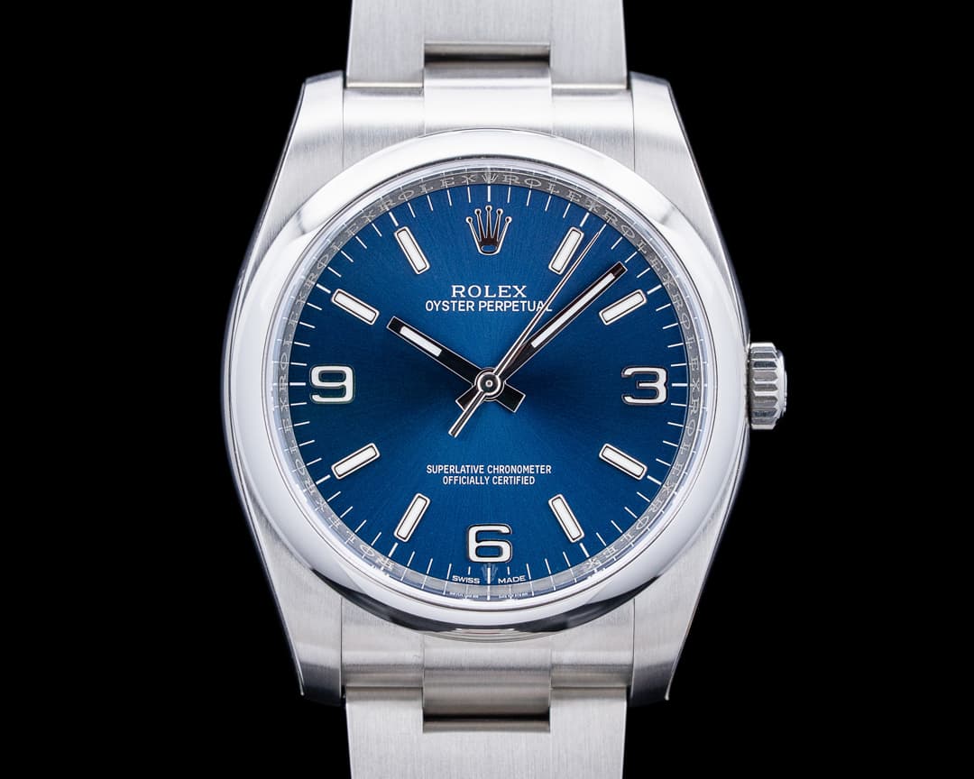 Rolex 116000 Oyster Perpetual SS Blue Dial UNWORN