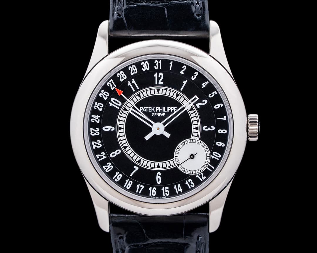 Patek Philippe 6006G Calatrava 18K White Gold Ebony Sunburst Black Dial