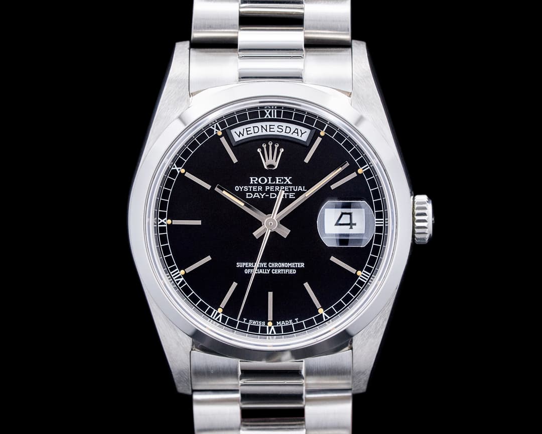 Rolex 18206 Day Date Platinum Black Stick Dial Circa. 1996