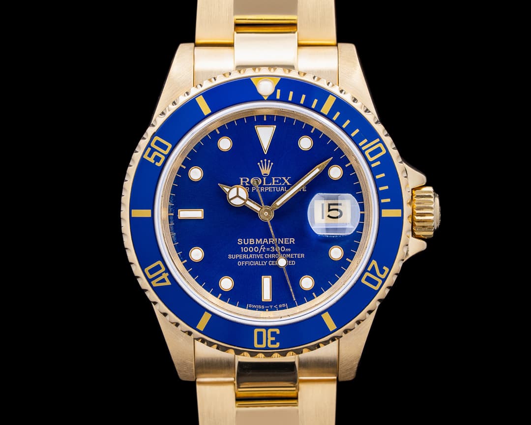 Rolex 16618 Submariner 18K Yellow Gold Blue Dial Circa. 1993