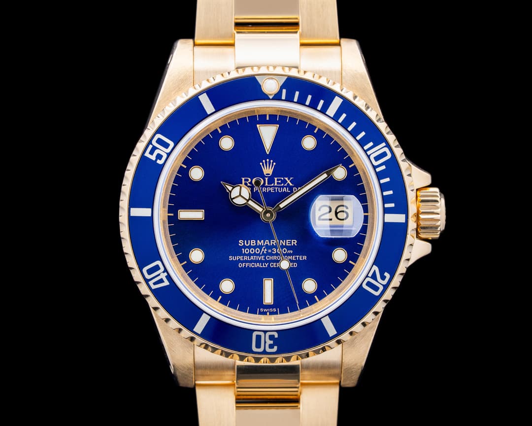 Rolex 16618 Submariner 18K Yellow Gold Blue Dial Circa. 1997