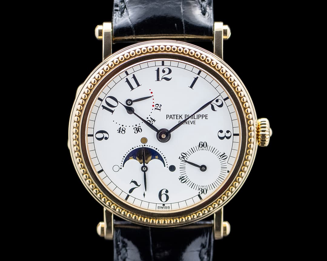 Image of Patek Philippe 5015J Complications Officer Moonphase Power Reserve 18K YG White Dial