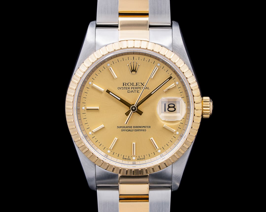 Rolex 15223 Oyster Perpetual Date 18K YG / SS Champagne Dial