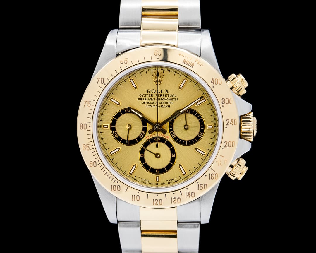 Rolex 16523 Daytona 18K YG / SS Champagne Dial